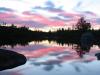 Red clouds over lake