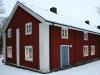 Red cabin with white corners
