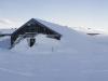 Sylarna mountain lodge in snow